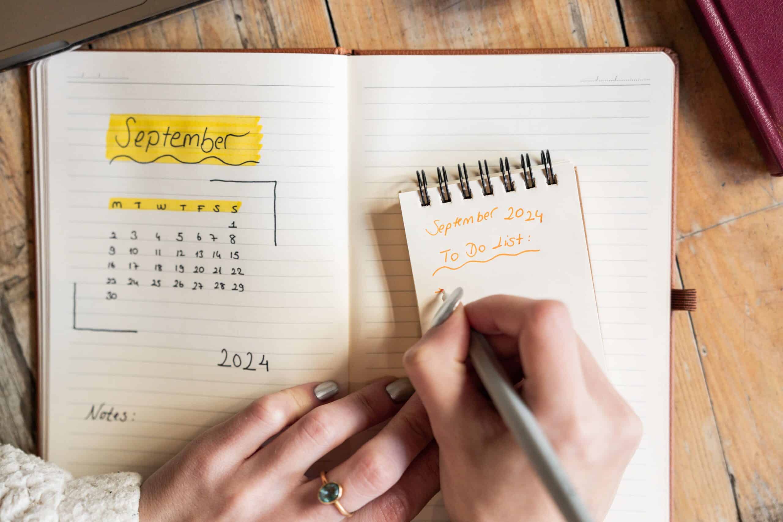 Woman writing a to-do list, working through the questions that decide a career pivot versus a career change
