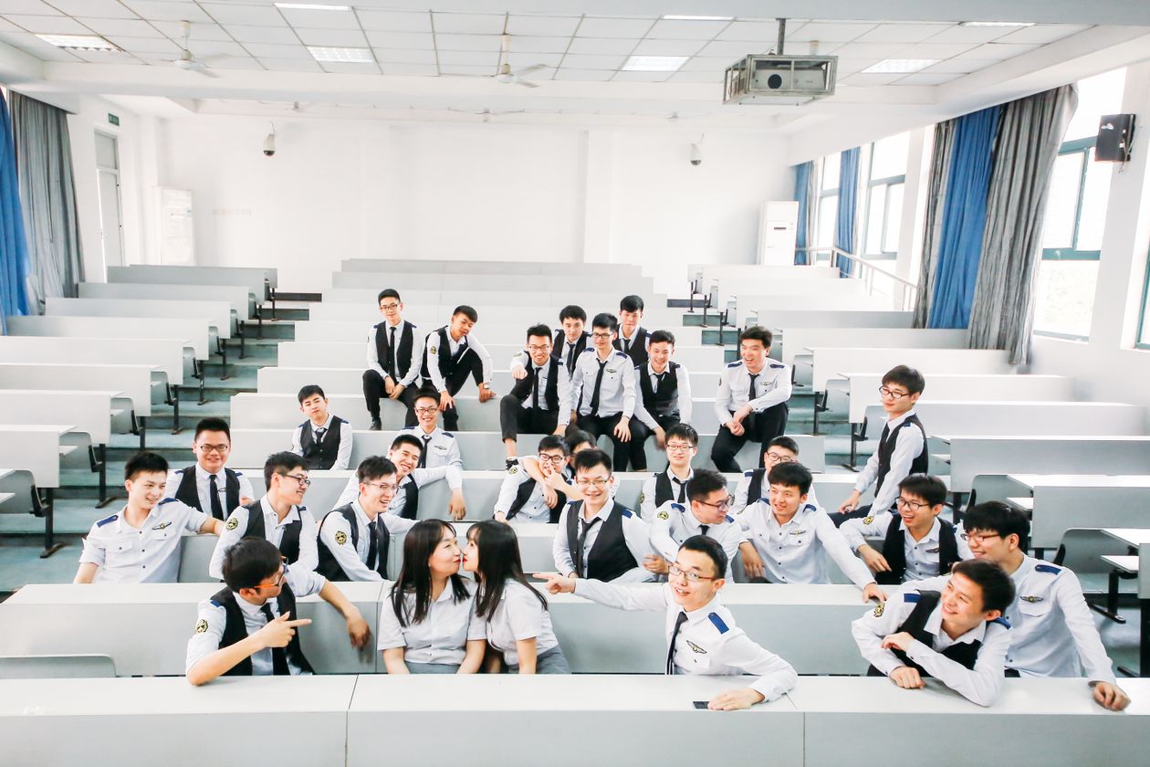 Group of adult students in a college classroom program
