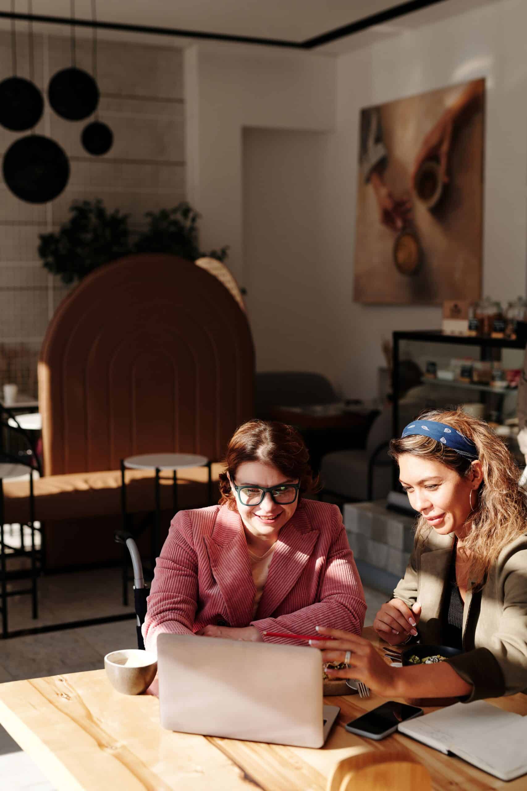 Two women having a meeting at a coffee shop, informational interview