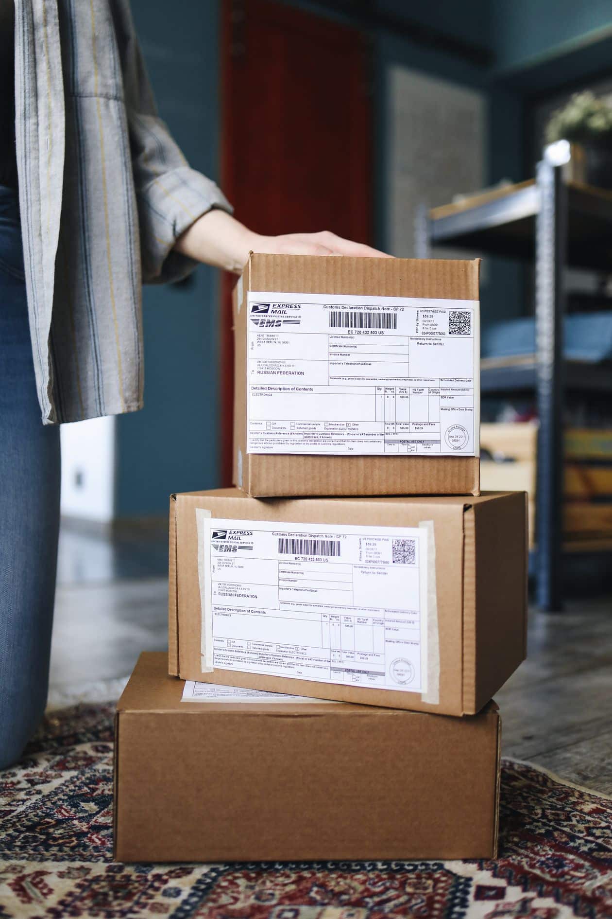 Stack of shipping boxes ready for delivery from a small Etsy business