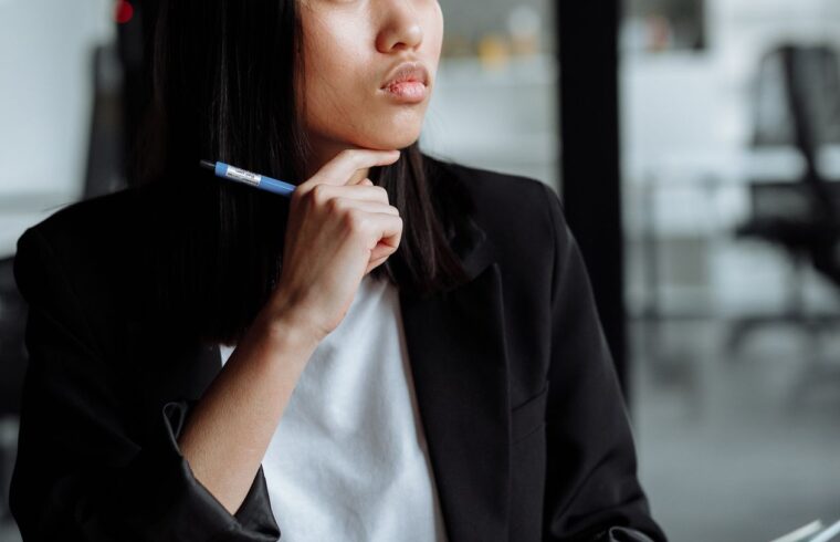 Woman reflecting on her money mindset before a career change