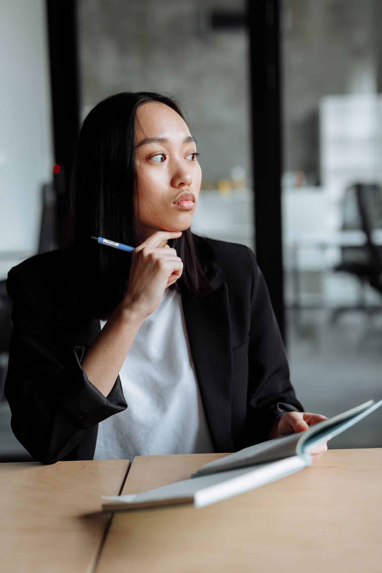 Woman reflecting on her money mindset before a career change