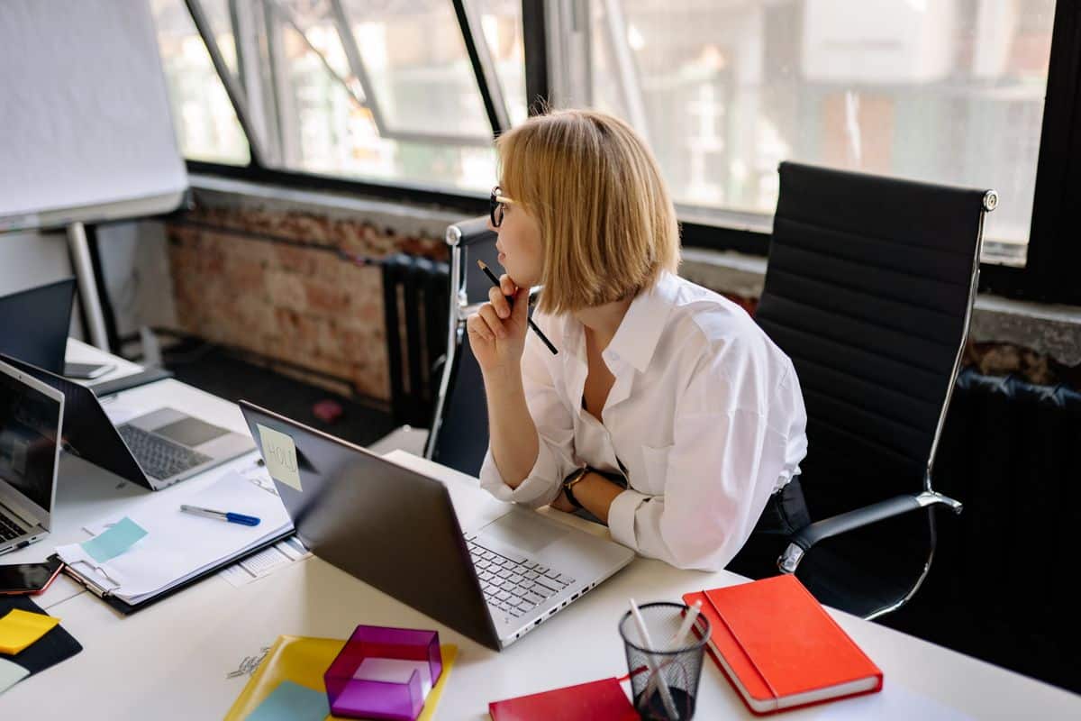 Woman thinking carefully before choosing a certification
