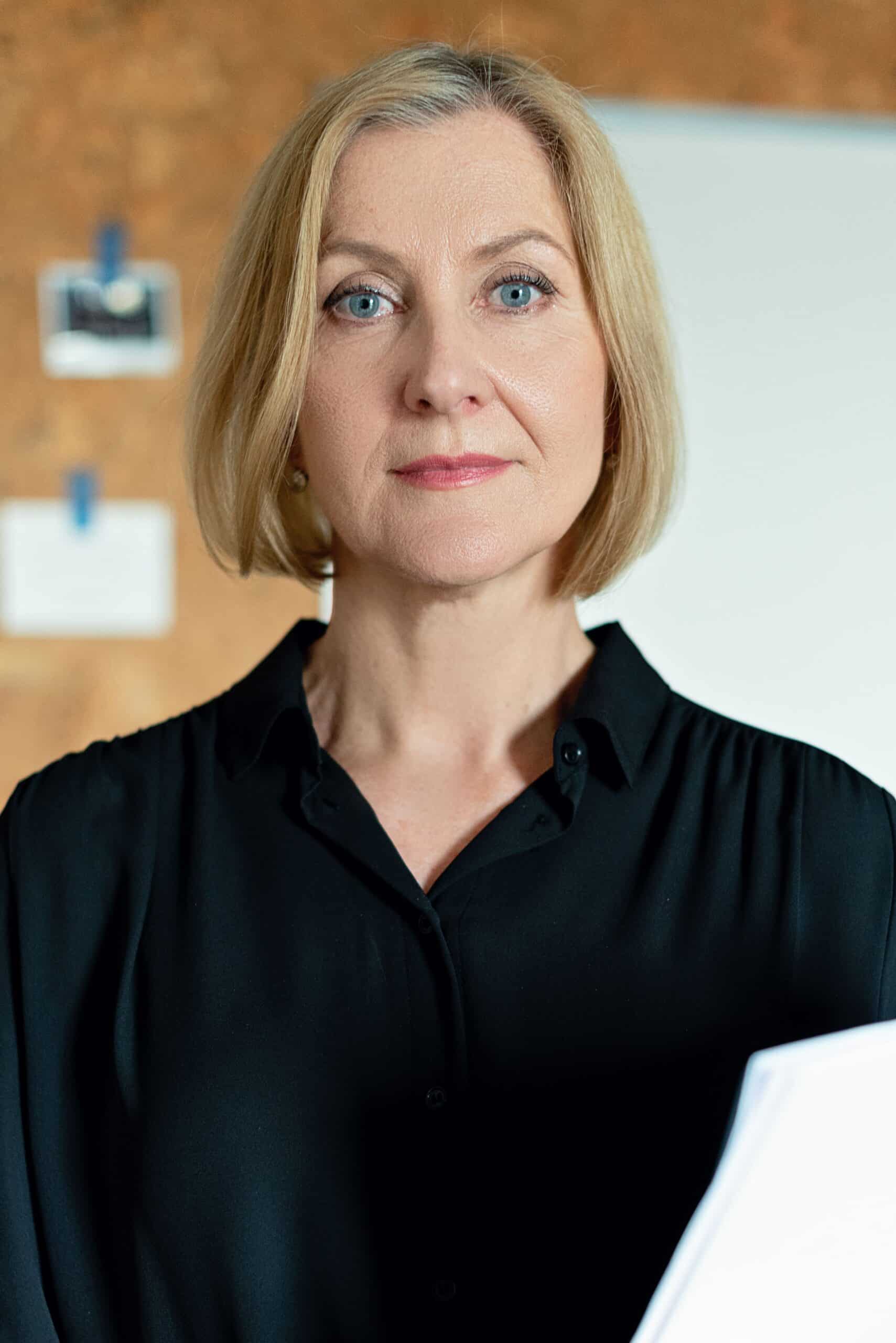 Confident professional woman, representing a completed career pivot into a new role