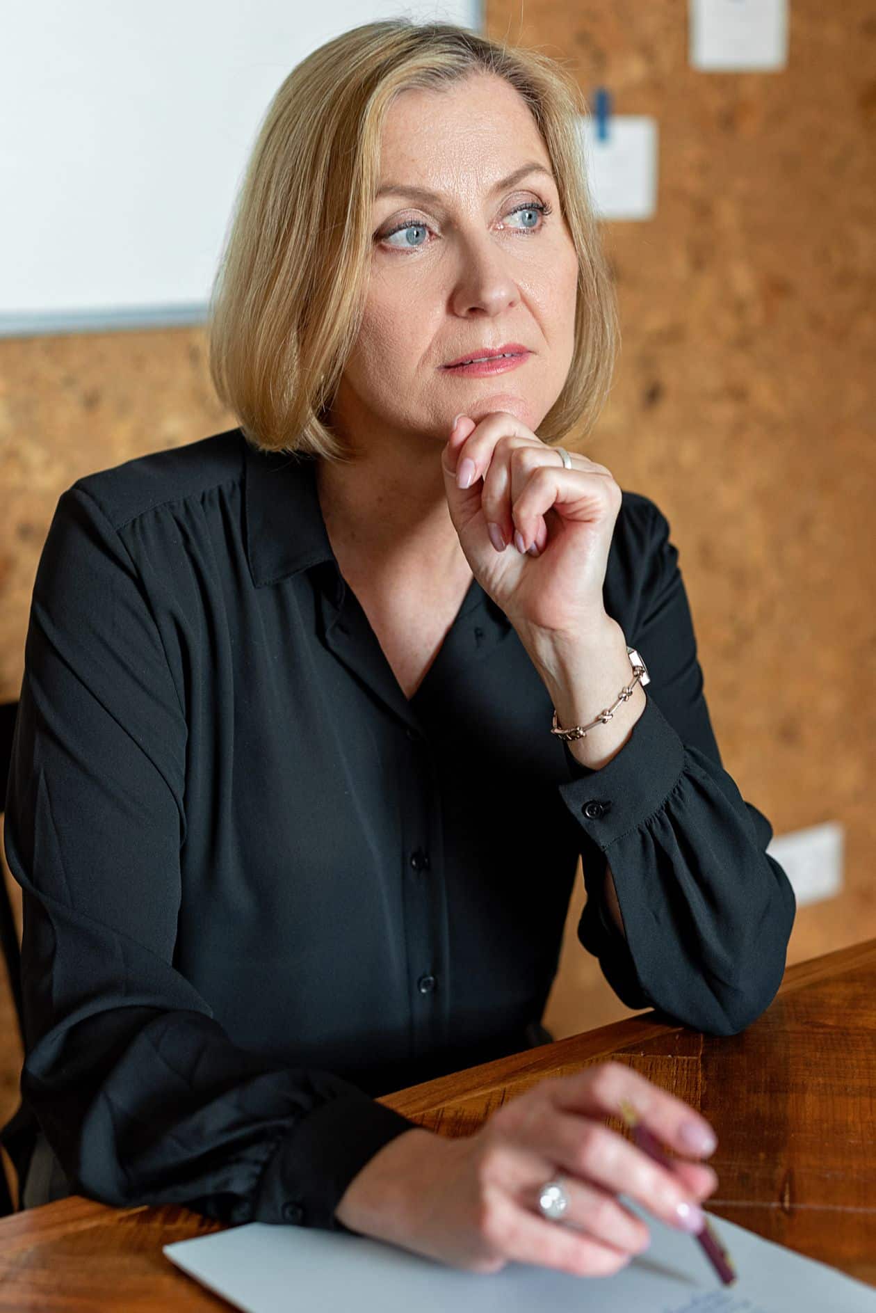 Woman thinking through whether going back to school at 40 is worth it
